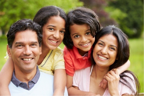 Family sharing healthy smiles