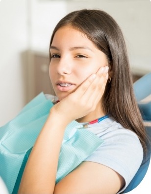 Person in pain before restorative dentistry